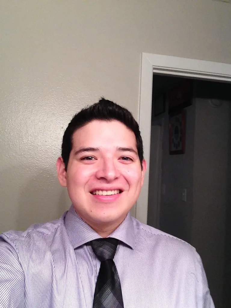 A client's original profile photo: a flat, indoor selfie